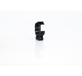 A black KC22 edge clip for corrugated tubing with the plastic clip in right angle on top of the clip, on a white background. The plastic clip has been opened.