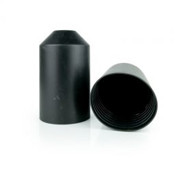 Two black HSEC cable end caps with spiral adhesive coating, one upright and one lying down, on a white background.