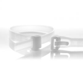 A releasable natural colored plastic cable tie, next to the enlarged head of another natural colored releasable cable tie.