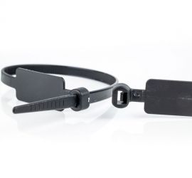 Two black plastic marker cable ties, with the label vertically on the cable tie. One of the cable ties is closed.