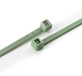 Two green polypropylene cable ties on a white background.
